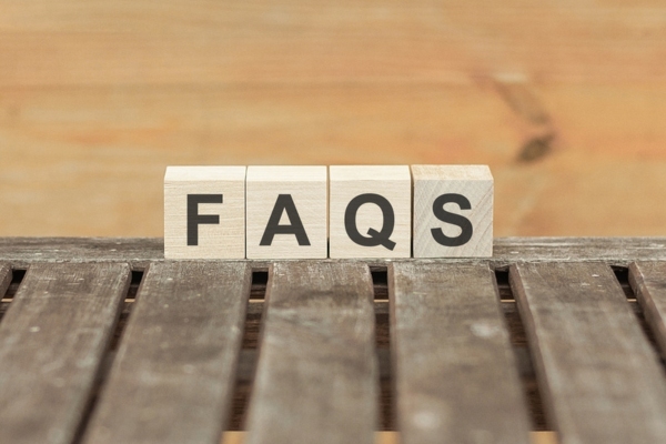 FAQS spelled using wooden letter chips depicting questions about supplemental ductless heating