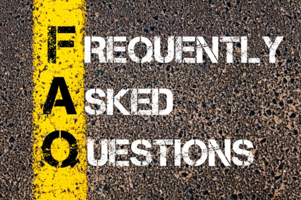 Frequently asked questions spray painted on concrete depicting questions about furnace replacement