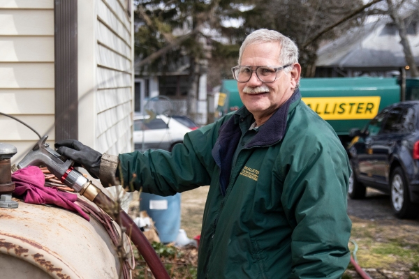 McAllister Energy technician delivering fuel oil