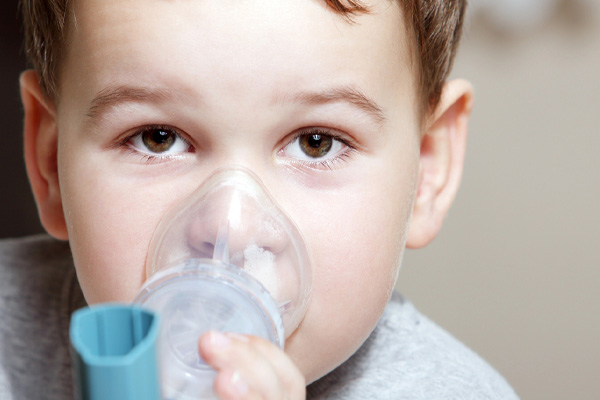 child with asthma depicting air quality issues when using air conditioner