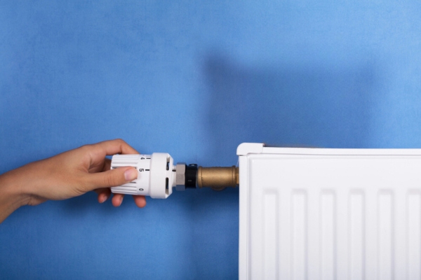 image of a hot water radiator installed against a wall