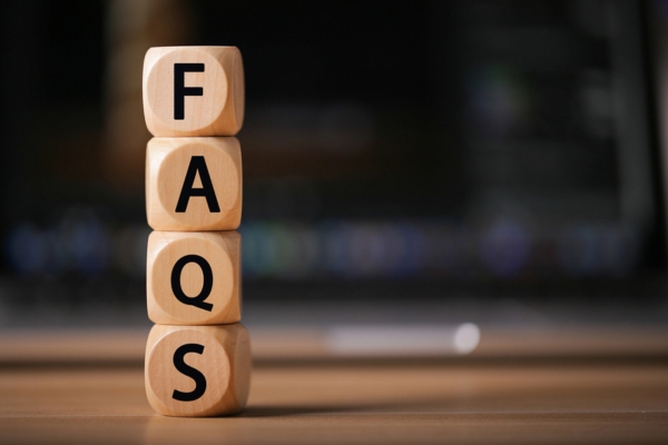 FAQS spelled vertically using wooden letter cubes depicting questions about ceiling fan direction