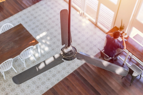 interior ceiling fan depicting direction for efficiency and comfort